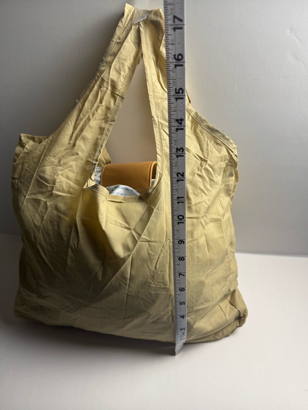 A foldable tote bag charm with carabiner clasp for easy use of reusable bag. - Picture 2 of 7